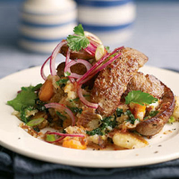 Twice-cooked pork sausages on bubble and squeak with sweet chilli sauce
