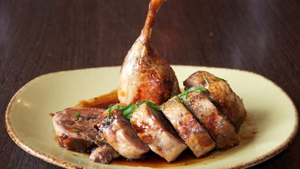 Twice-cooked rolled duck stuffed with couscous, fig, ginger and coriander