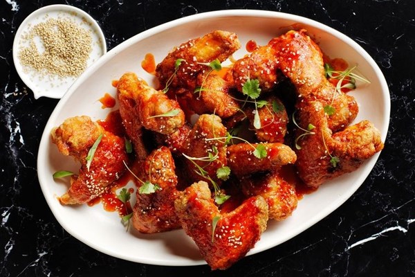 Twice-cooked Sriracha honey wings