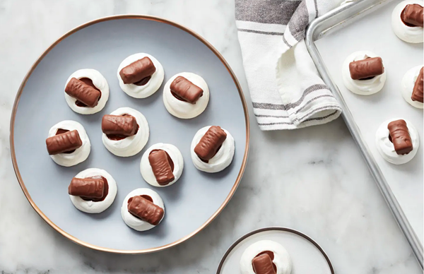 Twix®-topped meringue cookies