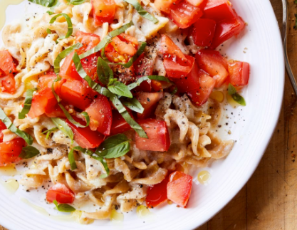 Two-cheese fusilli with marinated tomatoes