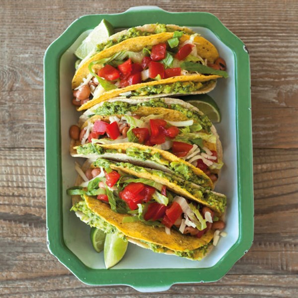 Two-layer tacos with pinto beans and guacamole