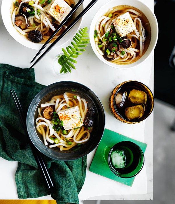 Udon noodle soup with shiitake mushrooms and tofu