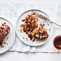 Ultimate baked banana on toast with labneh and almond brittle