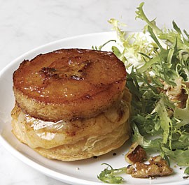 Upside-down apple-cheddar tarts with frisée and toasted walnuts