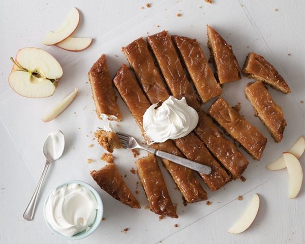Upside-down apple crisp cake [brown sugar oat crumble, sweetened whipped cream]