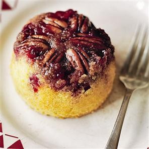 Upside-down cranberry, pecan and almond puddings with orange crème Anglaise