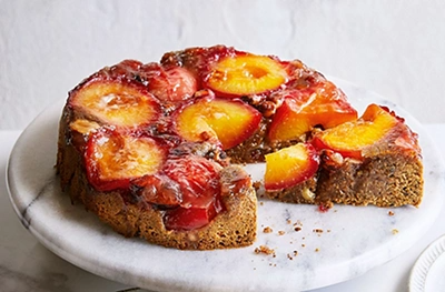 Upside-down plum & hazelnut cake