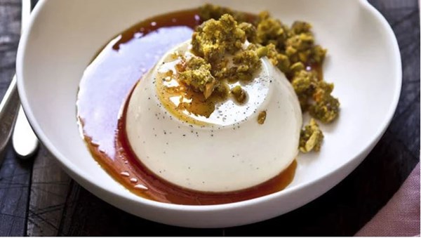Vanilla & rosemary panna cotta with scorched lemon syrup