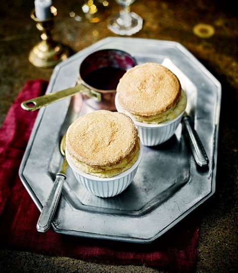 Vanilla and ginger soufflés with blackberry gin sauce