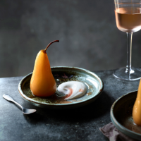 Vanilla and rosé-poached pears