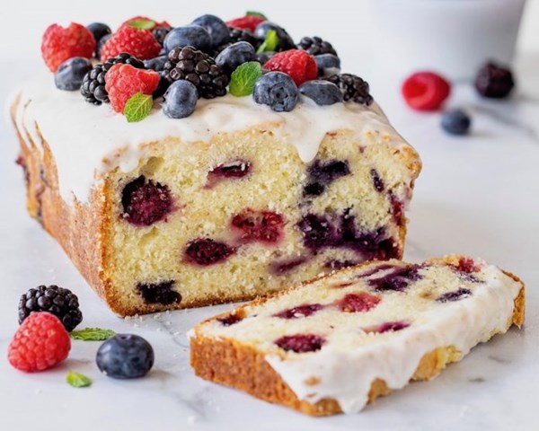 Vanilla bean berry pound cake with sour cream vanilla glaze