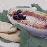 Vanilla bean brulee with blackcurrants