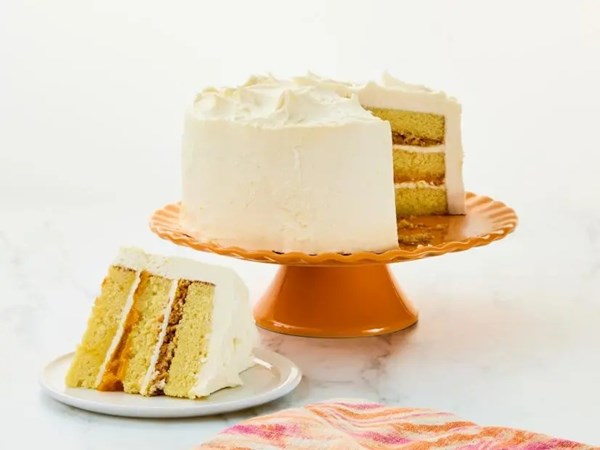 Vanilla cake with mango-passion fruit jam and coconut rum buttercream [Steven Tran] 