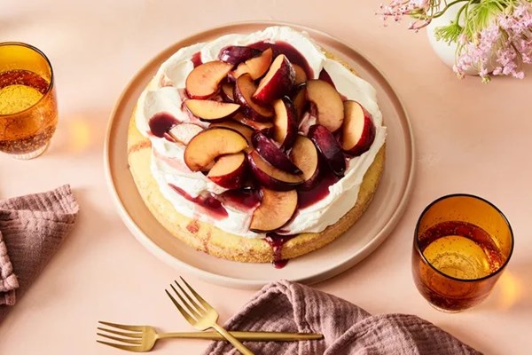 Vanilla cake with red wine-soaked plums & mascarpone whip