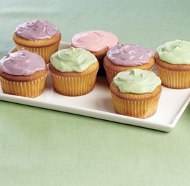 Vanilla cupcakes with purple cream cheese frosting