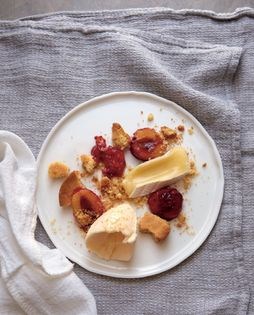Vanilla ice cream with baked plum, sablé and soft cheese