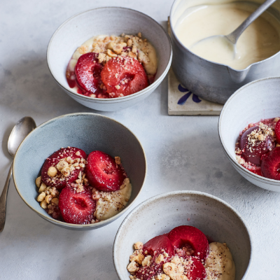 Vanilla poached plums, cardamom custard and hazelnut-sumac crumble