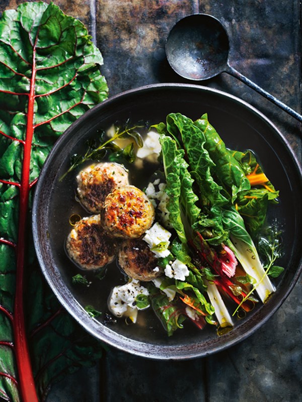Veal and rice meatball soup with lemon and rainbow chard