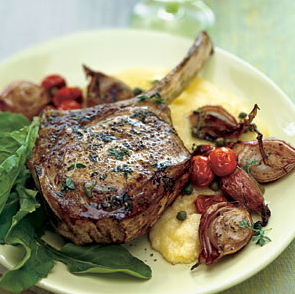 Veal chops with roasted shallots, arugula, and soft polenta