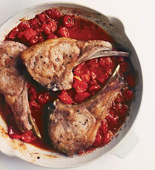 Veal chops with saffron orzo and tomato sauce