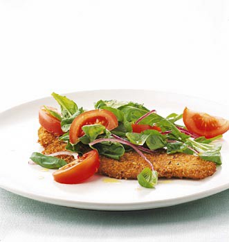 Veal cutlets with arugula and tomato salad