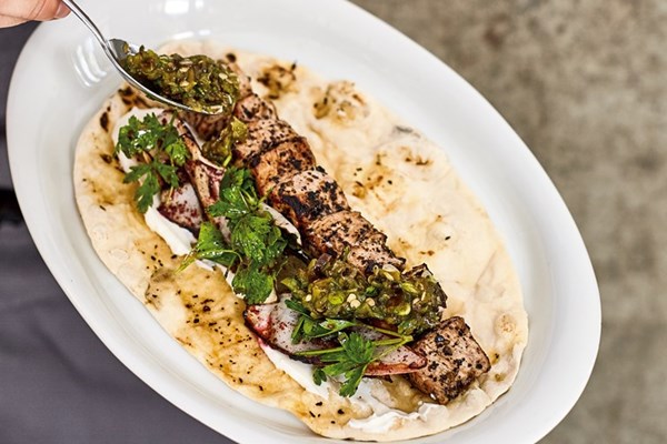 Veal shish & onion salad flatbread with charred sivri biber relish & yogurt