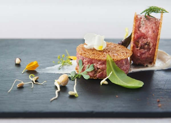 Veal tartare with figs, hazelnuts and anchovy butter