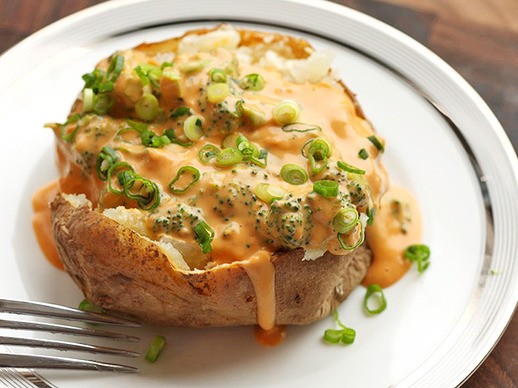 Vegan cheesy baked potatoes with broccoli