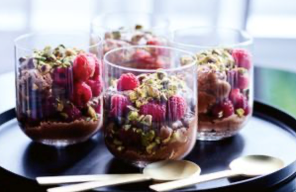 Vegan chocolate mousse with berries and pistachio