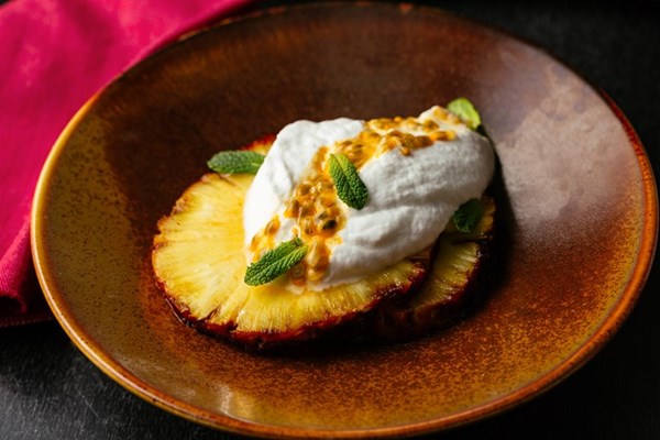 Vegan coconut mousse with passion fruit, lime and roasted pineapple