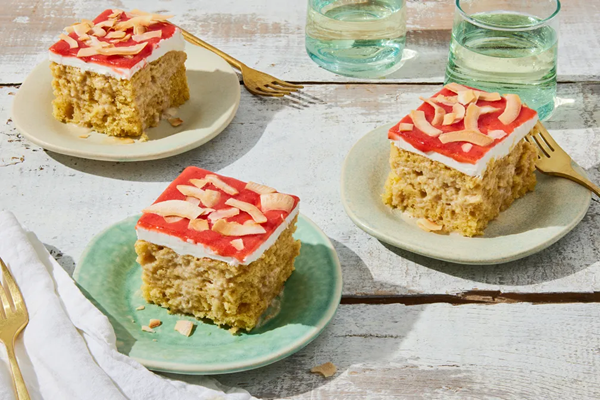 Vegan coconut tres leches cake with strawberry sauce