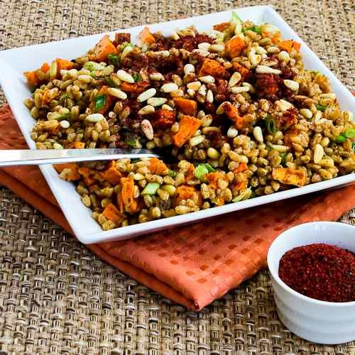 Vegan farro and roasted sweet potato salad with pine nuts and tahini-sumac vinaigrette