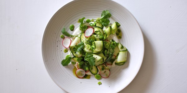 Vegan labneh, radish top sauce, courgette and broad bean salad