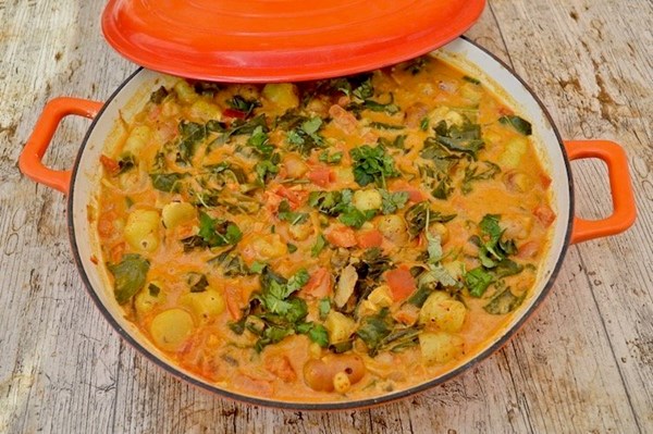 Vegan oca peanut stew with kale