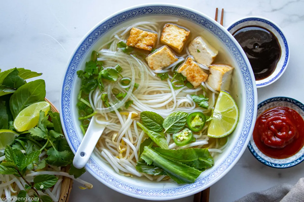 Vegan pho with tofu & herbs