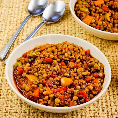 Vegan picadillo lentil stew with sweet bell peppers and green olives