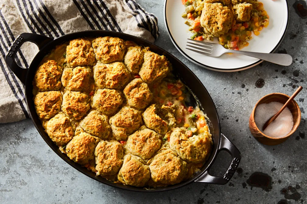 Vegan pot pie with herby biscuits