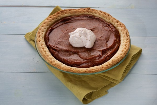 Vegan pumpkin pie with coconut cream