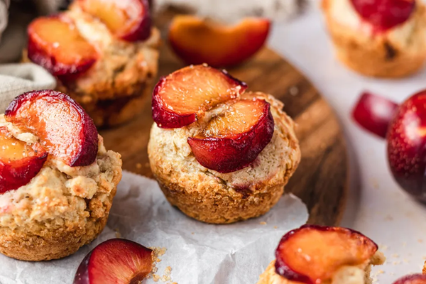 Vegan scones with maple-poached plums