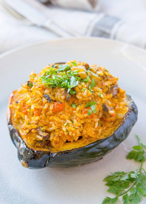 Vegan stuffed squash with brown rice and mushrooms