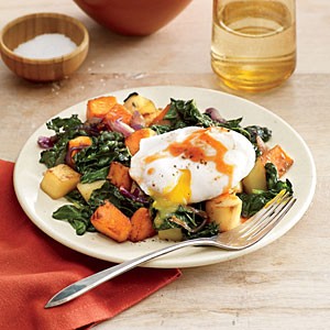 Vegetable and greens hash with poached egg