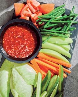 Vegetable crudités dipped in sambal (Lalapan)