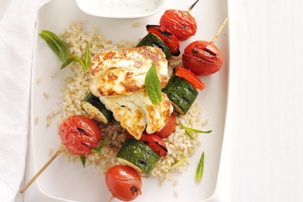 Vegetable kebabs with grilled haloumi, garlic yoghurt and lemon rice