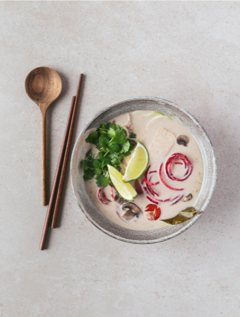 Vegetable noodles and tofu in coconut soup