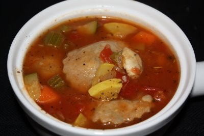Vegetable soup with whole wheat spinach ravioli