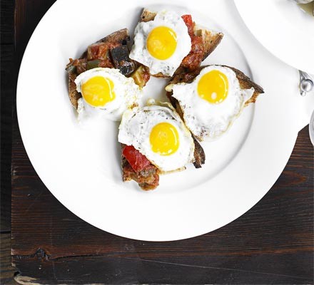 Vegetable stew on toast with quail's egg