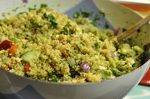 Vegetable stuffed quinoa salad with pesto dressing