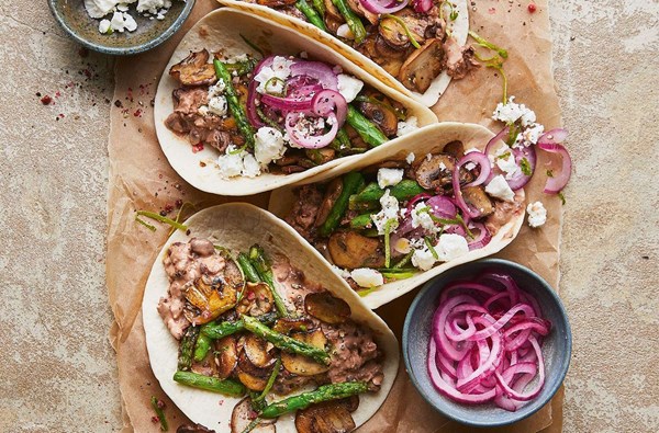 Vegetable tacos with quick-pickled onion, black beans & feta