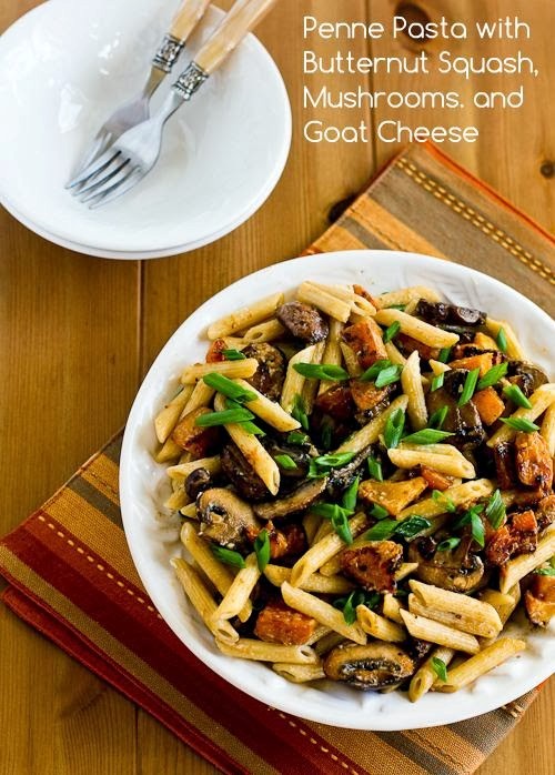 Vegetarian penne pasta with butternut squash, mushrooms, scallions, and goat cheese